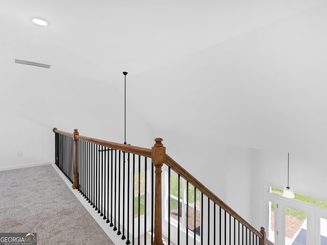 1215 White Oak Way, Griffin, GA 30224 - hallway with carpet flooring, lofted ceiling, and an upstairs landing