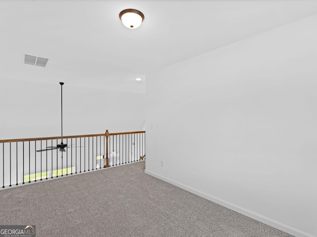 1215 White Oak Way, Griffin, GA 30224 - spare room with carpet floors and a ceiling fan