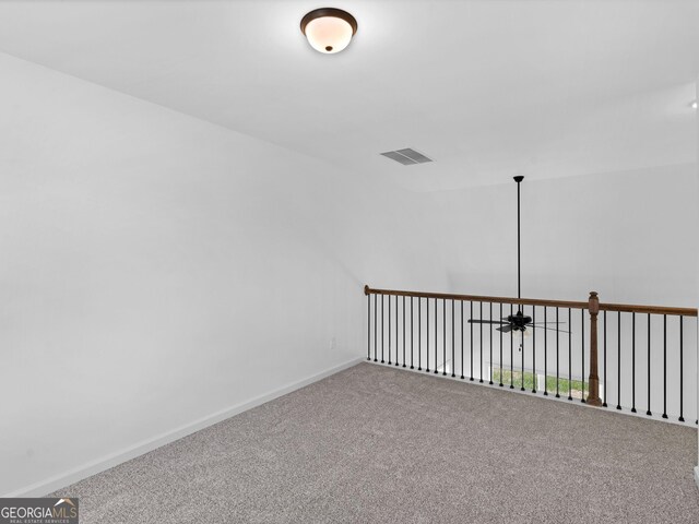 1215 White Oak Way, Griffin, GA 30224 - carpeted spare room featuring a ceiling fan and baseboards