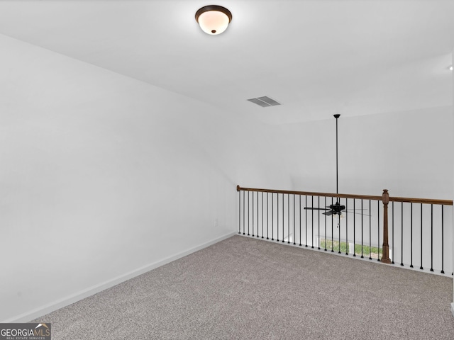 1215 White Oak Way, Griffin, GA 30224 - empty room with carpet floors, ceiling fan, and baseboards