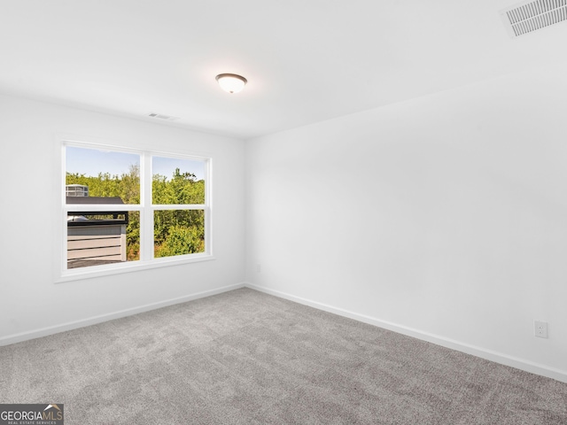 1215 White Oak Way, Griffin, GA 30224 - carpeted spare room featuring baseboards