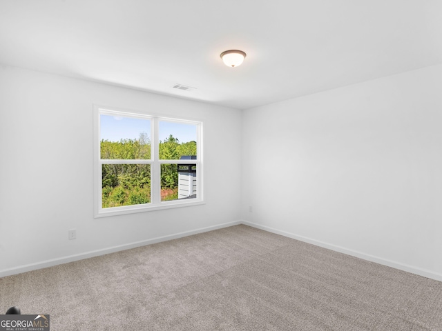 1215 White Oak Way, Griffin, GA 30224 - carpeted spare room with baseboards