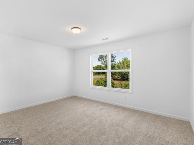 1215 White Oak Way, Griffin, GA 30224 - carpeted spare room with baseboards