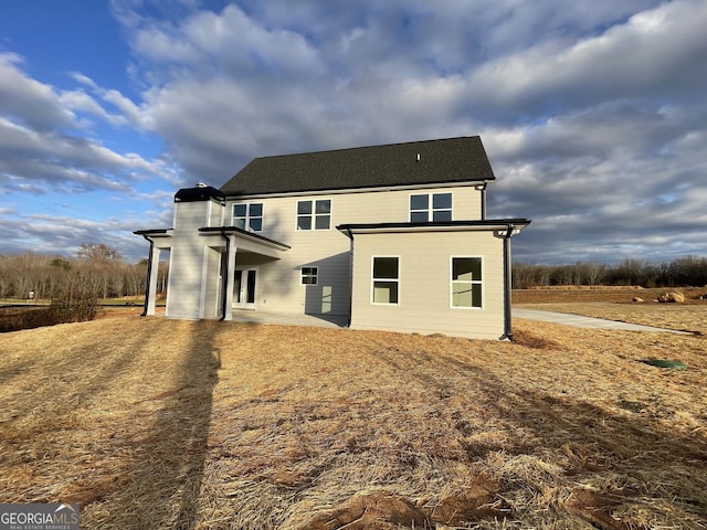 rear view of house with a patio area