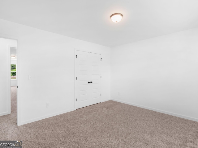 1215 White Oak Way, Griffin, GA 30224 - unfurnished room featuring carpet flooring and baseboards