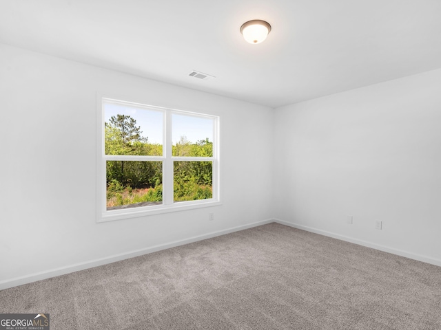 1215 White Oak Way, Griffin, GA 30224 - carpeted spare room with baseboards