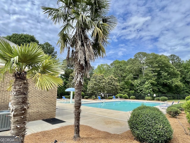 1215 White Oak Way, Griffin, GA 30224 - community pool with a patio and central air condition unit