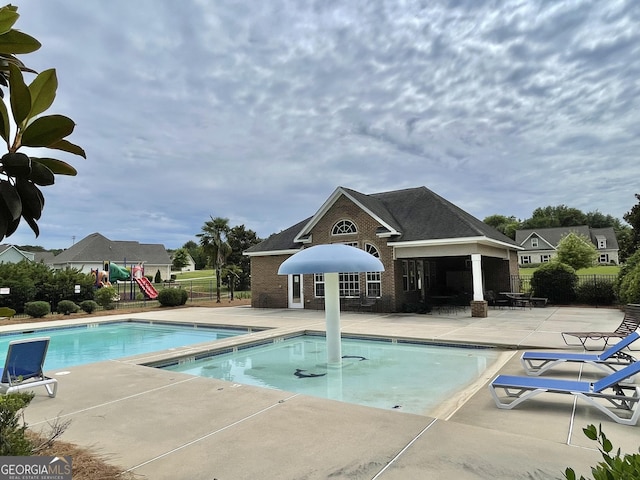 1215 White Oak Way, Griffin, GA 30224 - community pool featuring a patio