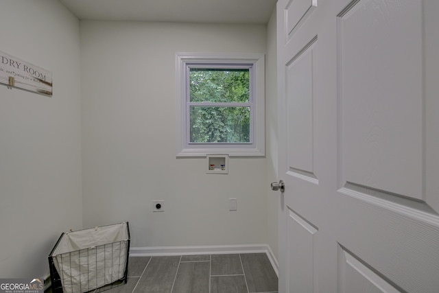 washroom featuring washer hookup and electric dryer hookup