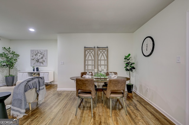 dining room featuring light wood-type flooring