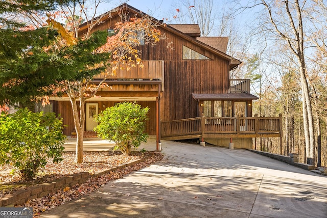 view of property exterior with a balcony