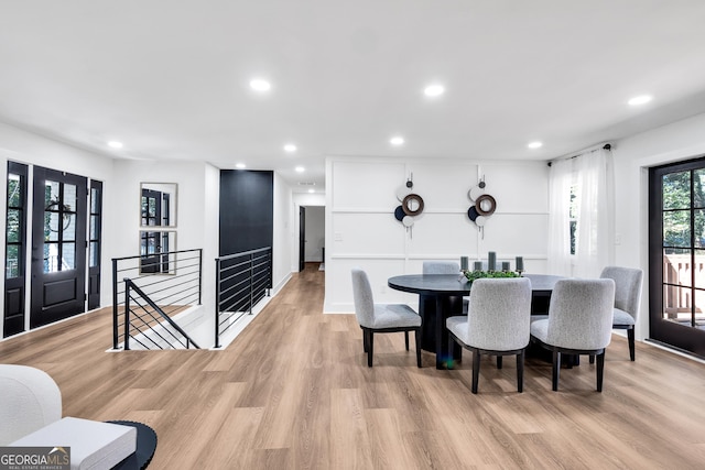 dining room featuring light hardwood / wood-style floors