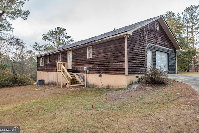 view of front of home with central air condition unit