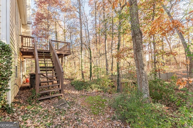 view of yard with a wooden deck