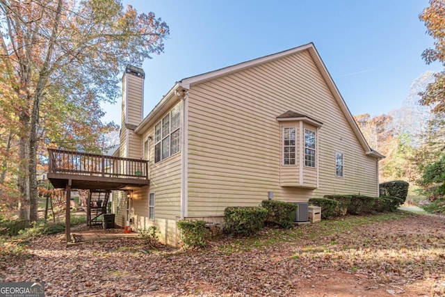 view of home's exterior featuring a deck