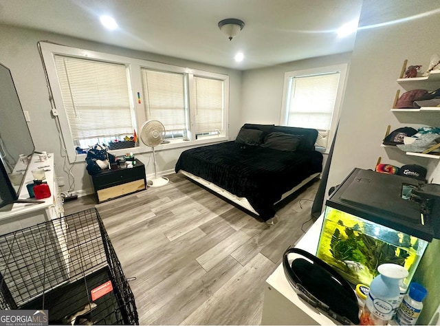 bedroom featuring light hardwood / wood-style floors