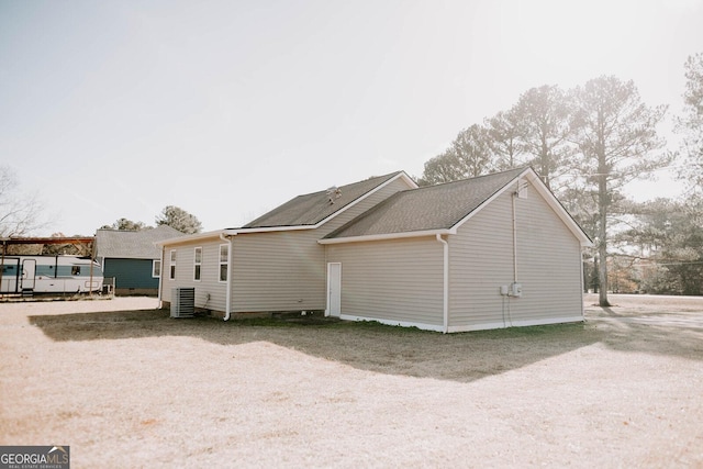 view of property exterior featuring central AC unit