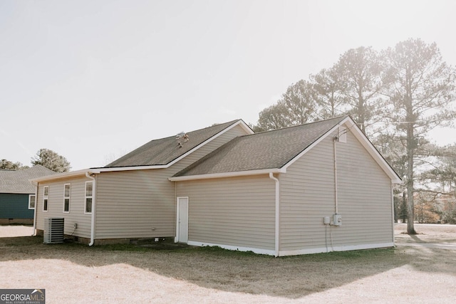 view of side of property featuring cooling unit