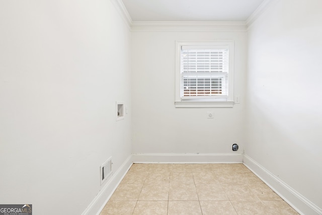 washroom featuring crown molding, light tile patterned floors, washer hookup, and hookup for an electric dryer