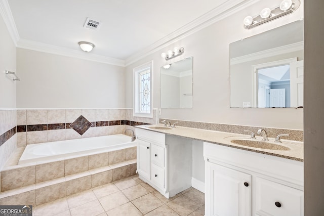 bathroom with vanity, ornamental molding, and tiled tub