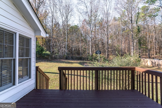 deck featuring a yard