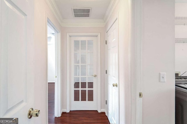 corridor featuring dark hardwood / wood-style floors and ornamental molding