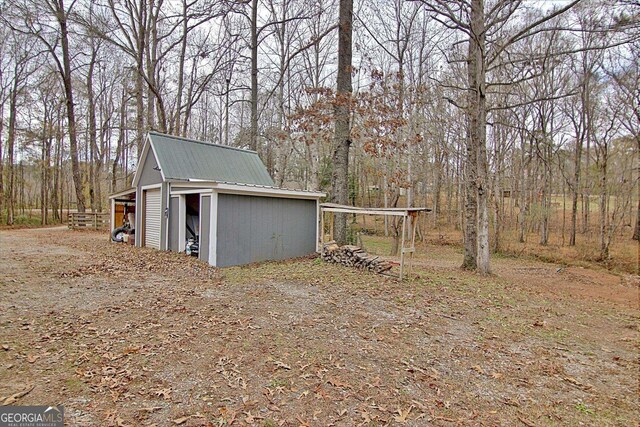 2020 Moore Rd, Moreland, GA 30259 - view of outdoor structure featuring an outbuilding and a wooded view
