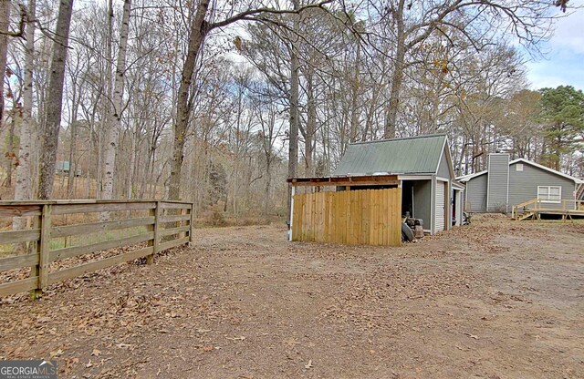 2020 Moore Rd, Moreland, GA 30259 - view of outdoor structure featuring fence and an outbuilding