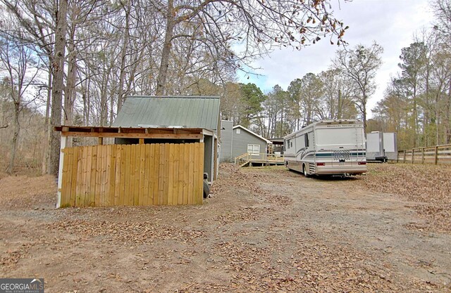 2020 Moore Rd, Moreland, GA 30259 - view of outbuilding featuring fence