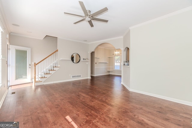 unfurnished living room featuring ornamental molding, hardwood / wood-style flooring, and a healthy amount of sunlight