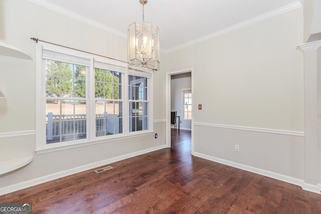 unfurnished dining area with dark wood-style flooring, visible vents, ornamental molding, a chandelier, and baseboards