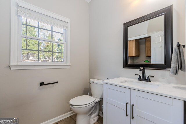 kitchen with appliances with stainless steel finishes, dark hardwood / wood-style floors, decorative light fixtures, and sink