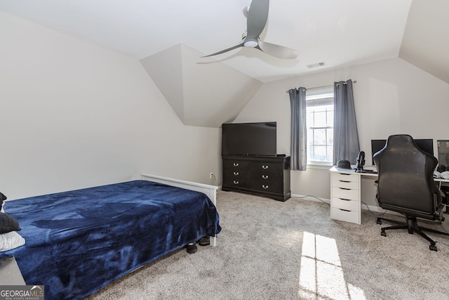 bedroom with lofted ceiling, light colored carpet, a ceiling fan, baseboards, and visible vents