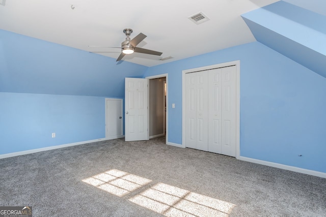 bonus room featuring carpet floors, vaulted ceiling, and ceiling fan