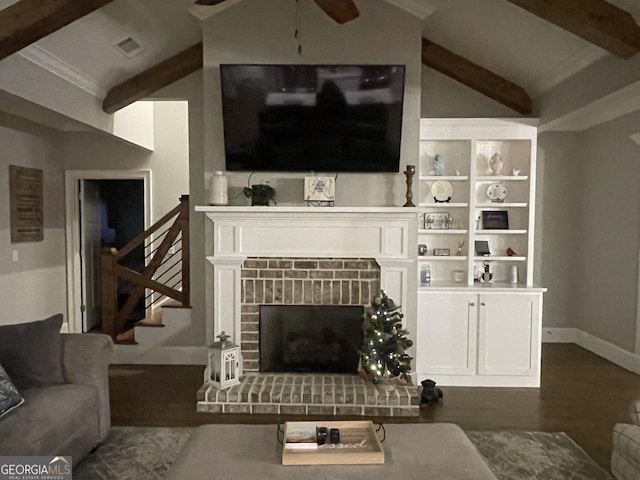 living room with a fireplace, vaulted ceiling with beams, dark hardwood / wood-style floors, and ceiling fan