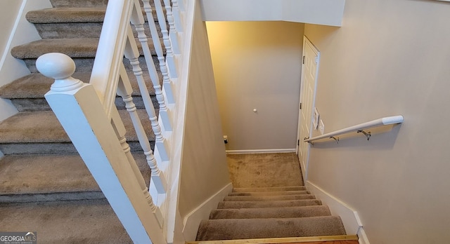 stairway with carpet floors