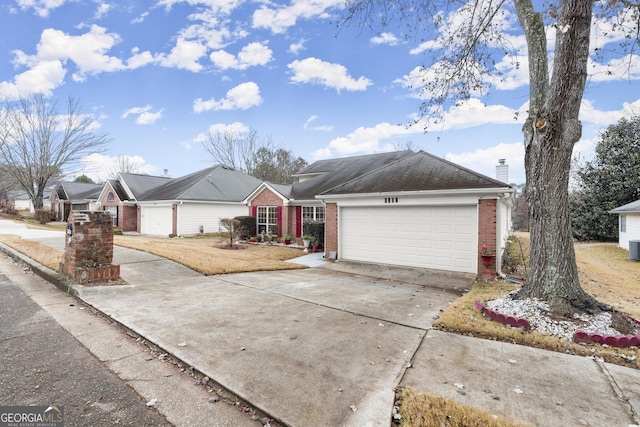 ranch-style home with a garage