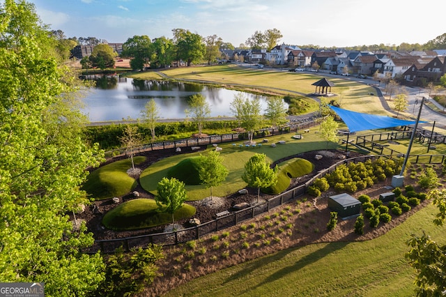 bird's eye view with a water view