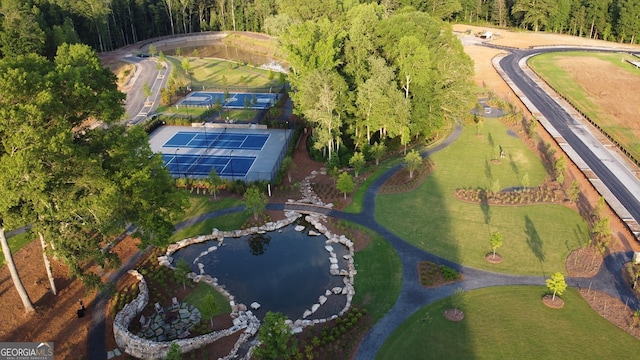 drone / aerial view with a water view