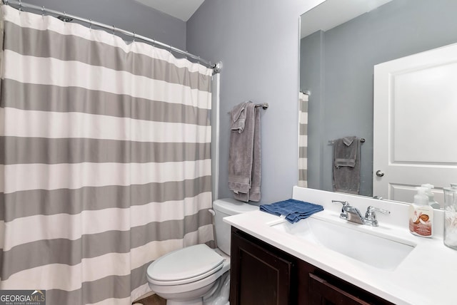 full bathroom with vanity, toilet, and a shower with curtain