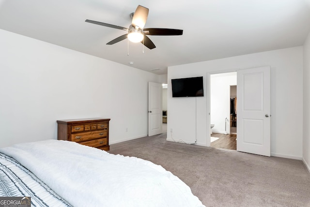 bedroom featuring baseboards, carpet, and a ceiling fan