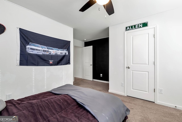 bedroom featuring carpet, baseboards, and ceiling fan