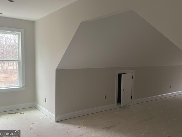 bonus room featuring vaulted ceiling