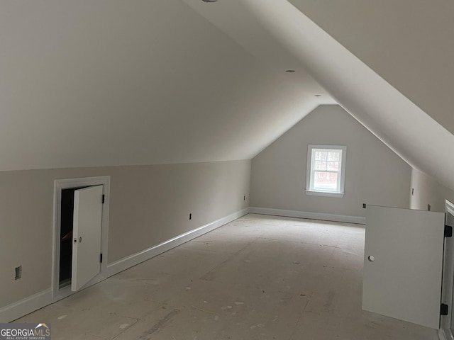 bonus room with vaulted ceiling