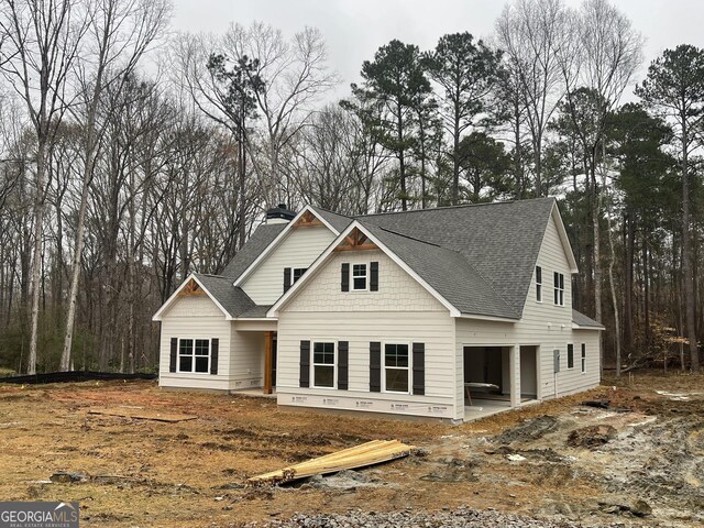 view of side of home with a garage