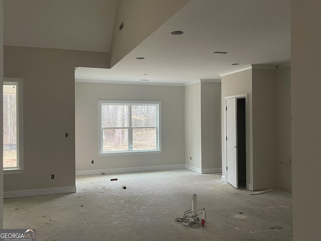 unfurnished room with crown molding