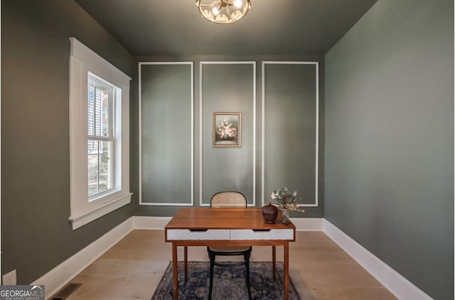 office space featuring light wood-type flooring