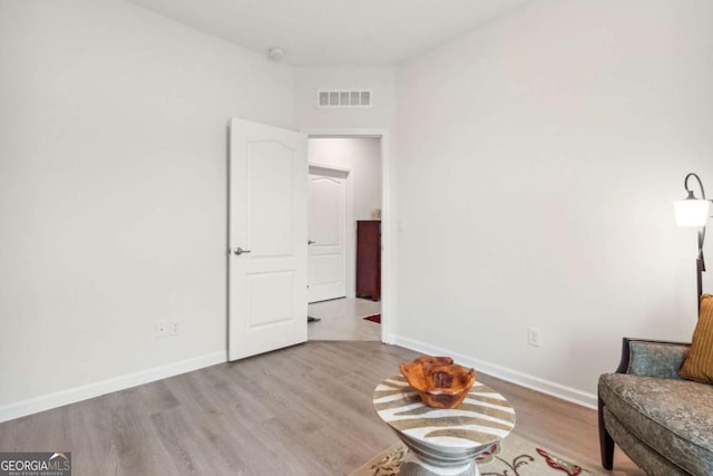 unfurnished room featuring light wood-type flooring