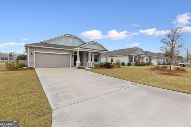 ranch-style house with a front lawn, a porch, and a garage
