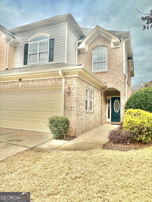 view of property with a garage